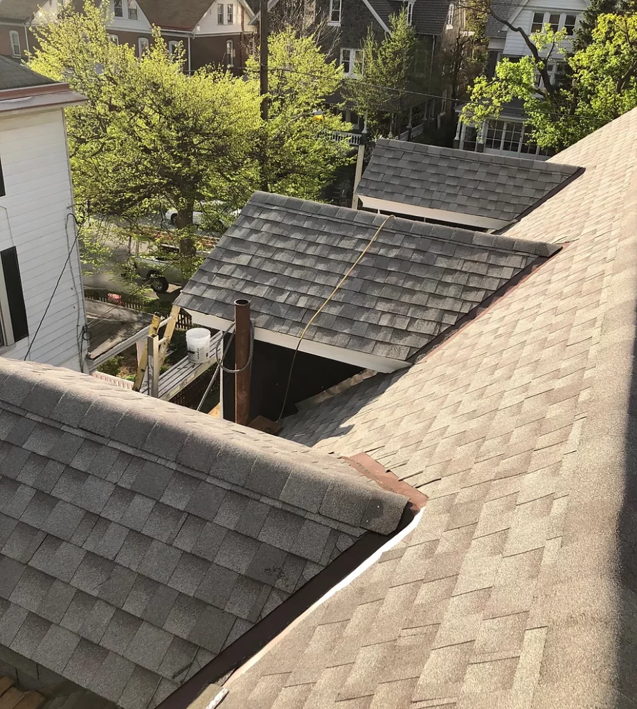 The perspective of a roofer standing on top of a roof.
