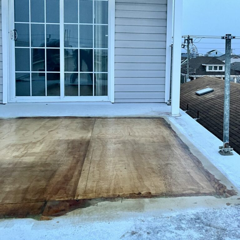 Application of fiberglass and resin to reinforce and reseal the deck surface.